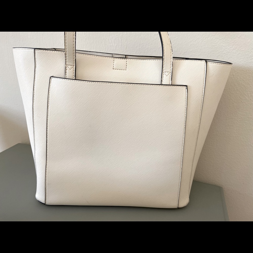 Love Vook tote. Color creme. 14”L across top, 12”L across bottom, 11”H X 5”W.